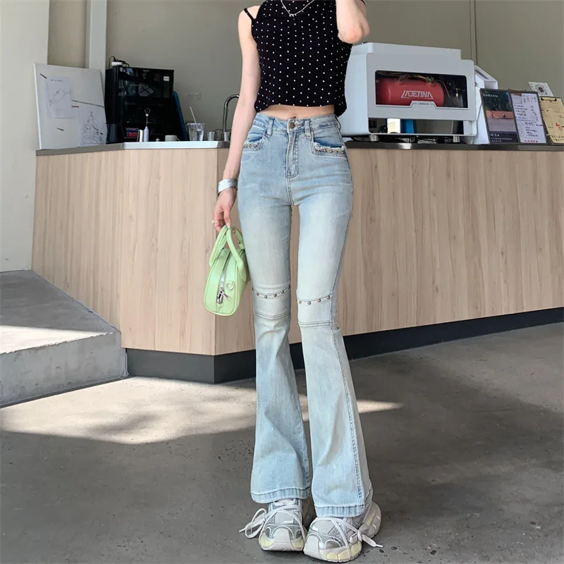 Женские джинсы Y2K Trend 2025 года — эластичные расклешенные джинсовые брюки в стиле Dongdaemun с высокой талией, облегающие брюки с заклепками в американском стиле ретро 
Женские джинсы Y2K Trend 2025 года — эластичные расклешенные джинсовые брюки в стиле Dongdaemun с высокой талией, облегающие брюки с заклепками в американском стиле ретро
