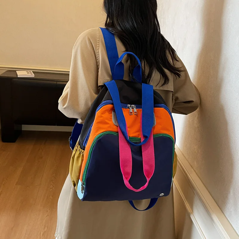 Lightweight, color-blocking casual women's travel backpack, simple and multi-functional single-shoulder bag
Lightweight, color-blocking casual women's travel backpack, simple and multi-functional single-shoulder bag