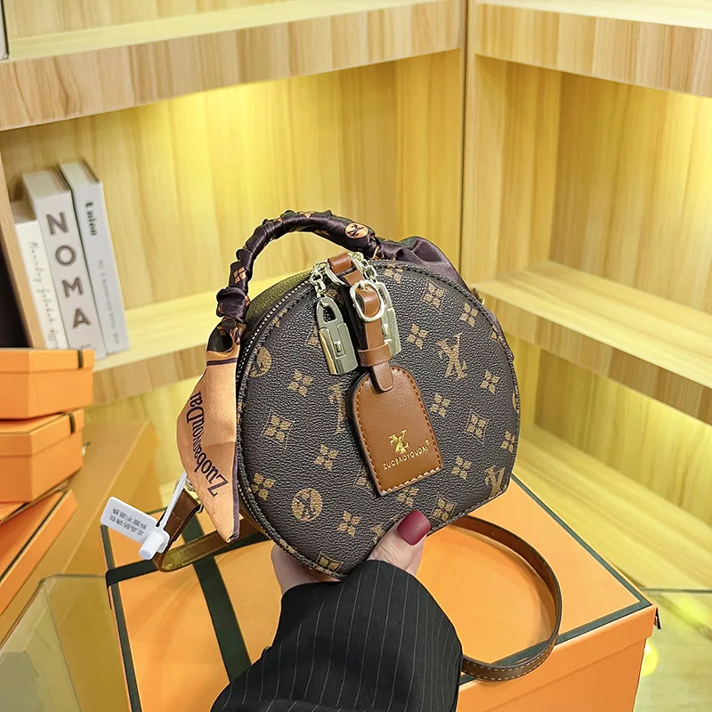 Fashionable small round-shaped handbag for women, retro printed, single shoulder bag, casual crossbody bag for women
Fashionable small round-shaped handbag for women, retro printed, single shoulder bag, casual crossbody bag for women