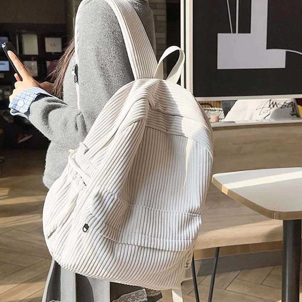 Легкий вельветовый рюкзак в японском стиле, портативная однотонная школьная сумка, регулируемый, большой вместимости, повседневный рюкзак для студентов
Легкий вельветовый рюкзак в японском стиле, портативная однотонная школьная сумка, регулируемый, большой вместимости, повседневный рюкзак для студентов