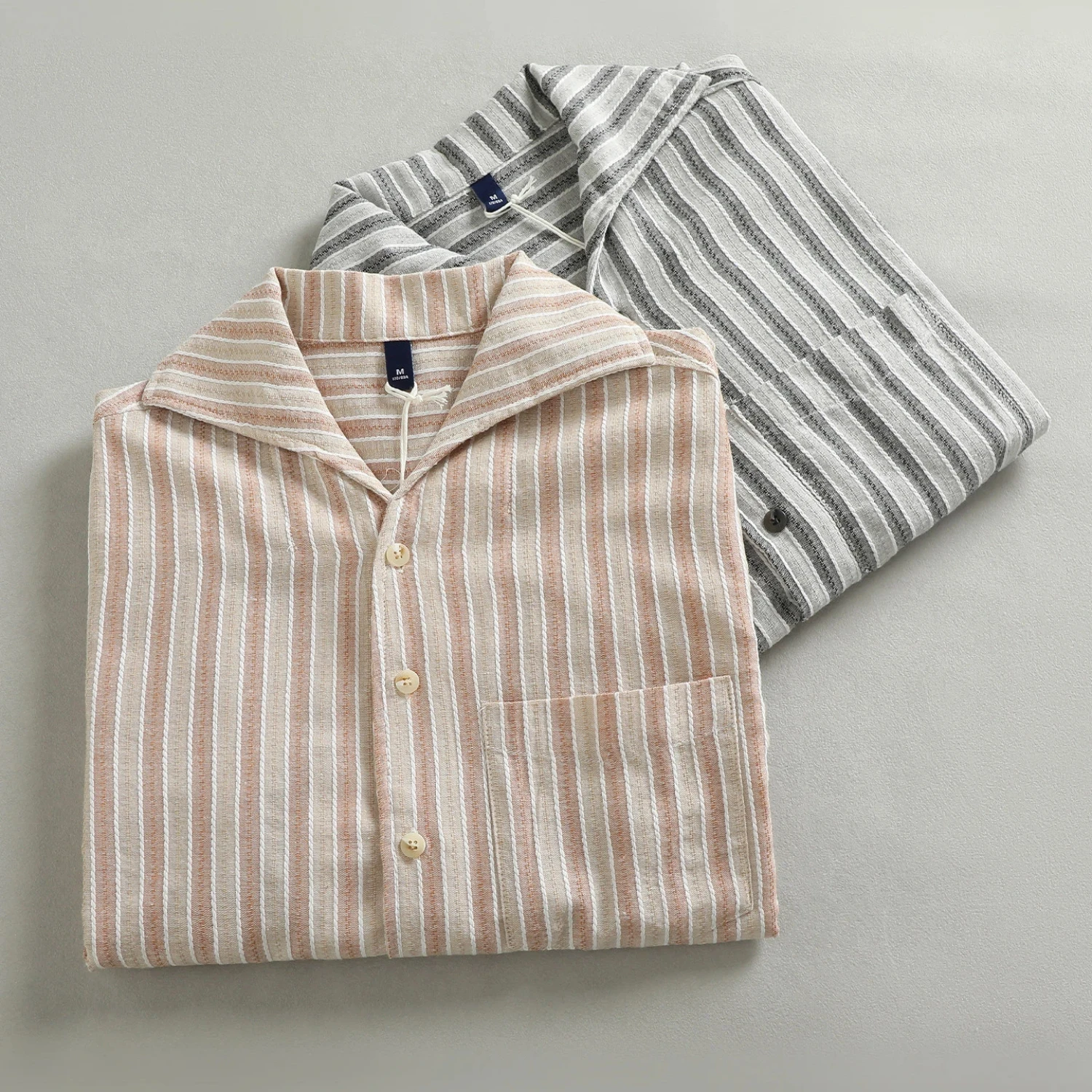 Summer new style lapel striped short-sleeved shirt for men loose casual breathable holiday style cardigan top
Summer new style lapel striped short-sleeved shirt for men loose casual breathable holiday style cardigan top