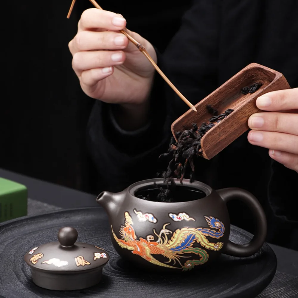 Dragons Phoenixs Pattern Changes Color Purple Clay Teapot Chinese Style Hand-made KungFu Teapot Retro Filter Hole Design
Dragons Phoenixs Pattern Changes Color Purple Clay Teapot Chinese Style Hand-made KungFu Teapot Retro Filter Hole Design
