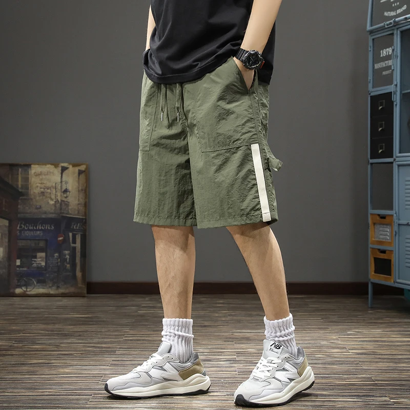 Summer matching thin ice silk cargo casual shorts men's loose large size ins fashion brand sports fifth straight leg pants
Summer matching thin ice silk cargo casual shorts men's loose large size ins fashion brand sports fifth straight leg pants