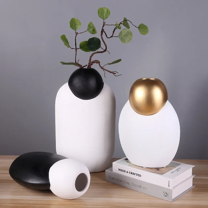 Nordic Black White Ceramic Vase Frosted Color Matching Vase Crafts Desktop Ornament Flower Arrangement Simple Home Decoration
Nordic Black White Ceramic Vase Frosted Color Matching Vase Crafts Desktop Ornament Flower Arrangement Simple Home Decoration
