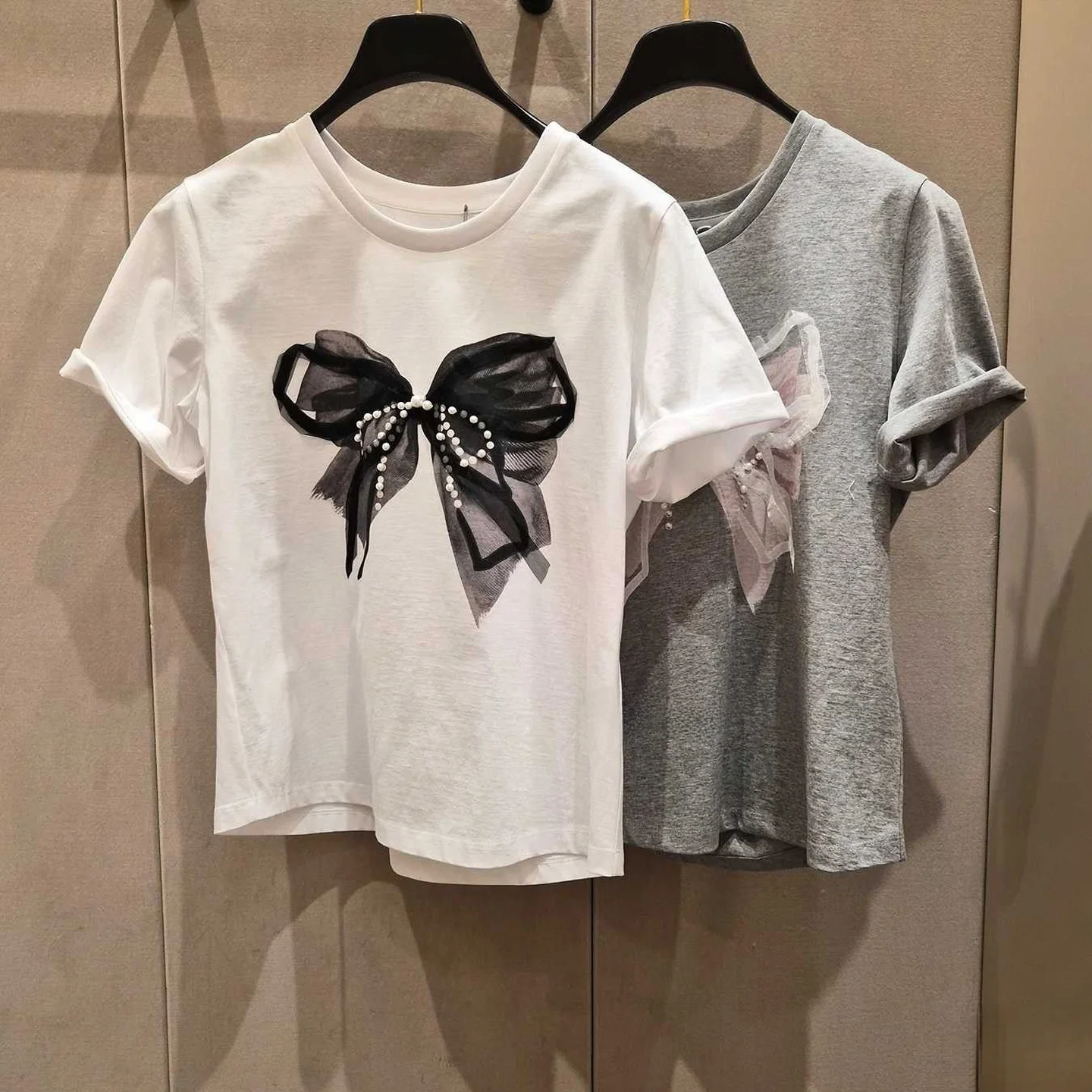 Korean Sle Pure Cotton Knot T-irt round Ne ort Sve Commute Versatile irt Women's Faion Spring Summer
Korean Sle Pure Cotton Knot T-irt round Ne ort Sve Commute Versatile irt Women's Faion Spring Summer