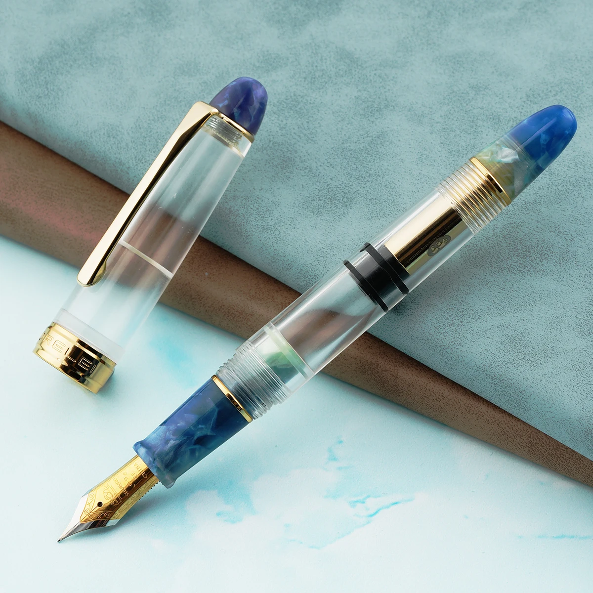 LORELEI 019 Resin Fountain Pen with Converter Transparent Blue Golden Clip Iridium EF/F 0.38/0.5mm Ink Pen for Business Office
LORELEI 019 Resin Fountain Pen with Converter Transparent Blue Golden Clip Iridium EF/F 0.38/0.5mm Ink Pen for Business Office