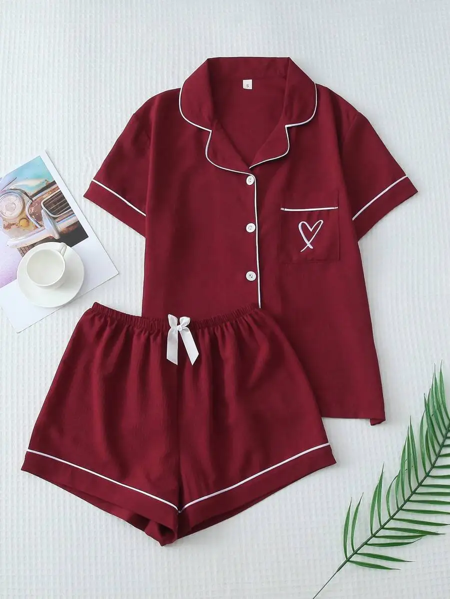 Womens Solid Color Summer Pajama Set With Contrast Trim Embroidered Heart Button-Up Shirt And Bowknot Shorts
Womens Solid Color Summer Pajama Set With Contrast Trim Embroidered Heart Button-Up Shirt And Bowknot Shorts