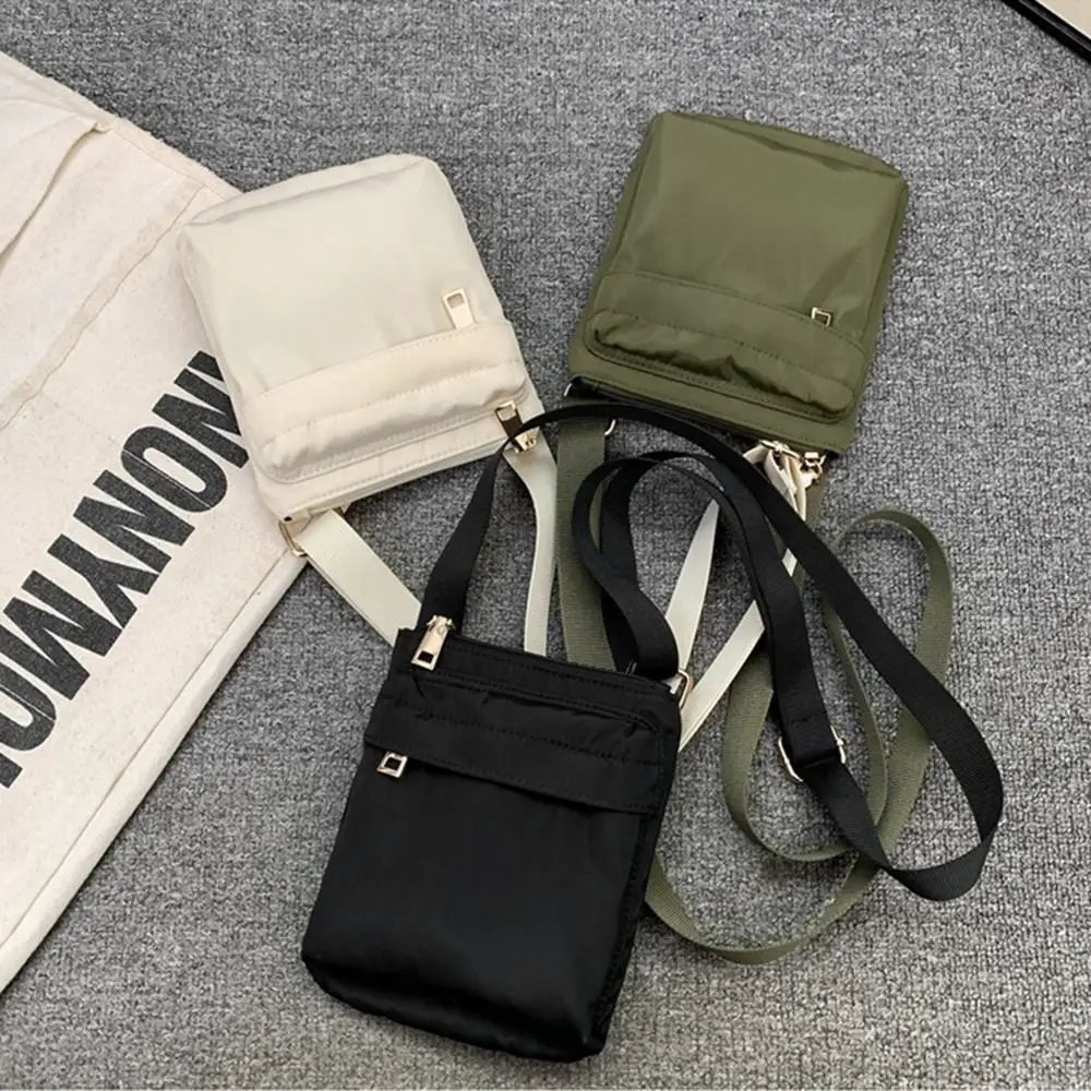 Multifunctional Crossbody Phone Pouch Korean Style Handheld Nylon Shoulder Bag Street Style Solid Color Men Square Bag Woman
Multifunctional Crossbody Phone Pouch Korean Style Handheld Nylon Shoulder Bag Street Style Solid Color Men Square Bag Woman