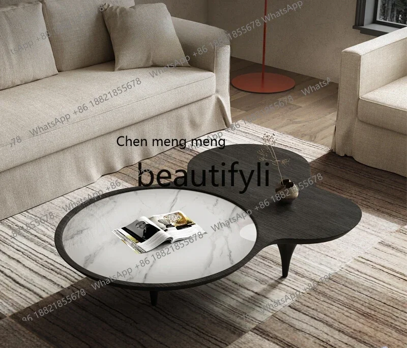 Designer special-shaped coffee table high-end art minimalist rock slab personalized tea table
Designer special-shaped coffee table high-end art minimalist rock slab personalized tea table
