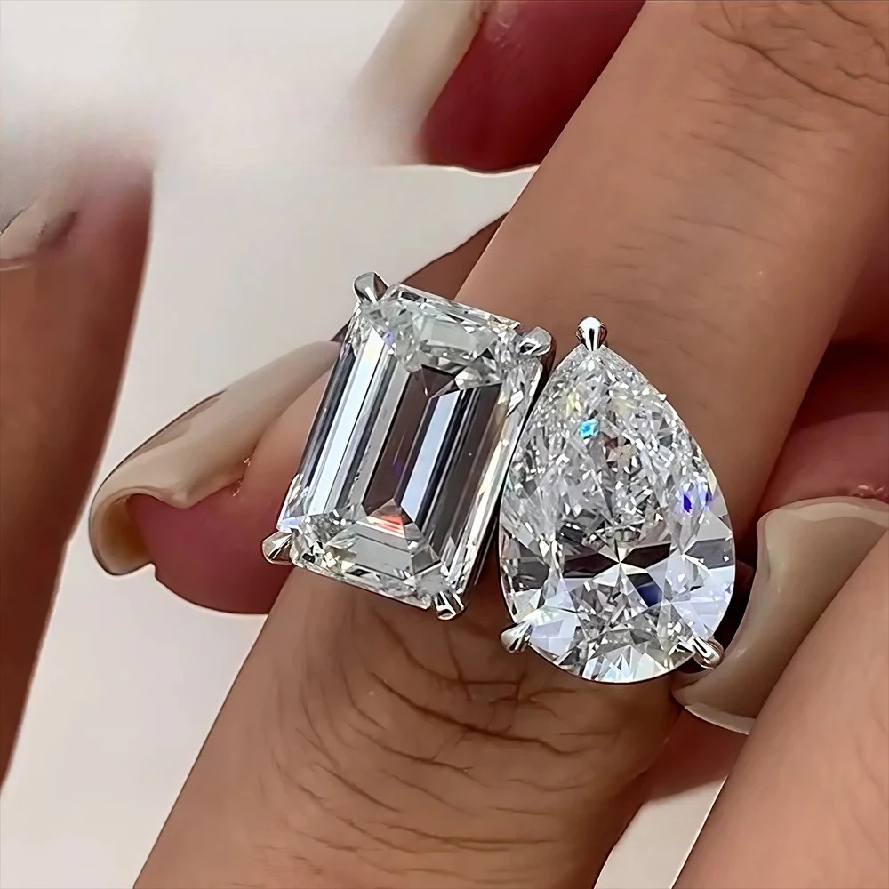 Обручальные кольца с муассанитом и бриллиантами (5 карат) в форме груши и изумруда для женщин, с двумя камнями, из стерлингового серебра 925 пробы, с сертификатом
Обручальные кольца с муассанитом и бриллиантами (5 карат) в форме груши и изумруда для женщин, с двумя камнями, из стерлингового серебра 925 пробы, с сертификатом