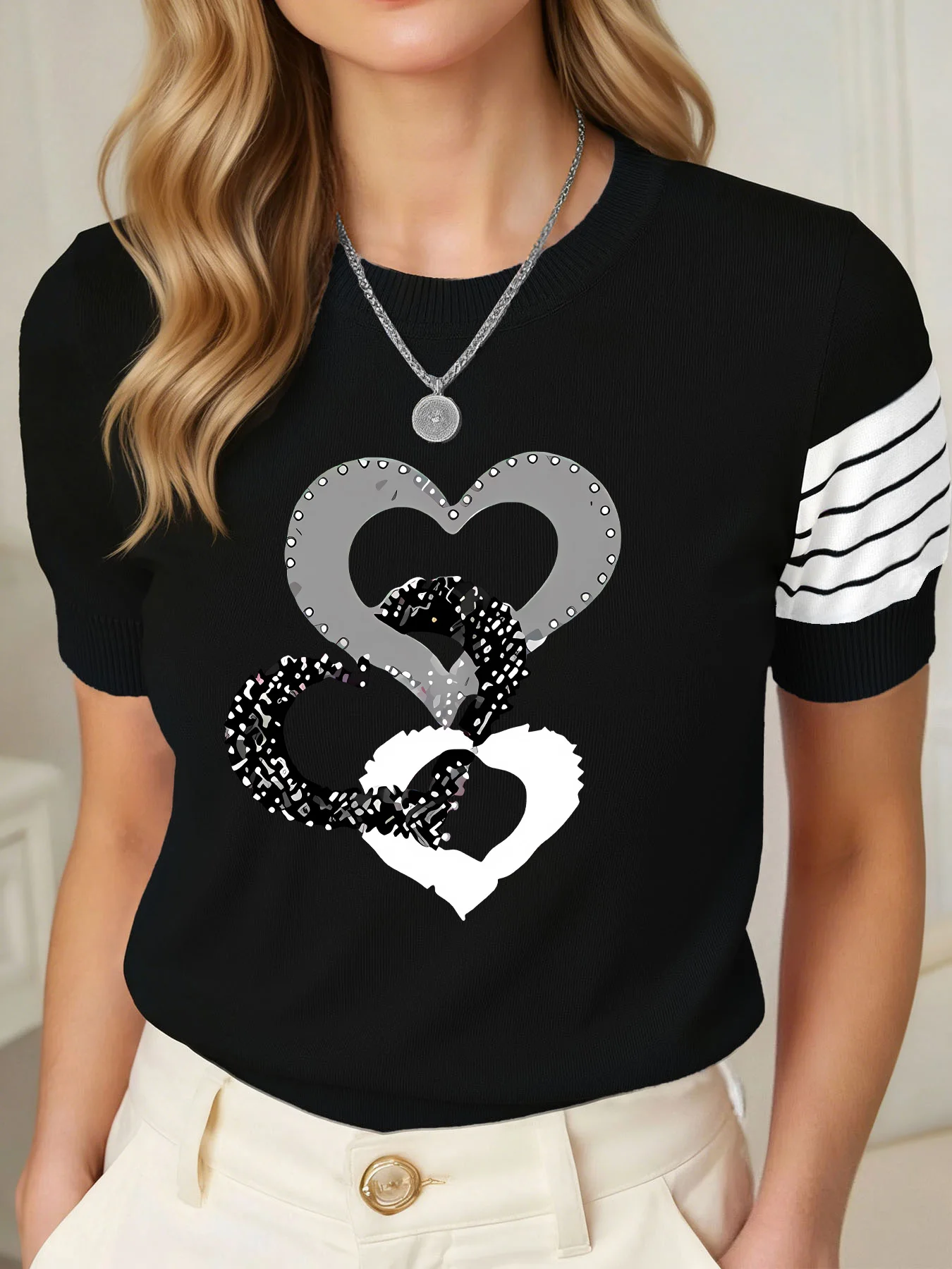 Women's Knit Sweater with Heart & Snake Print Short Sleeve Top
Women's Knit Sweater with Heart & Snake Print Short Sleeve Top