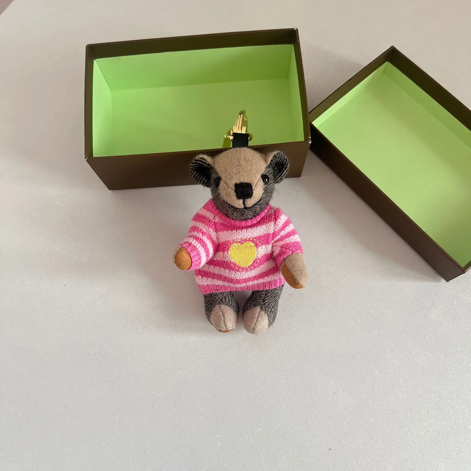 Bear home pendant cashmere T-shirt shape teddy bear car keychain car hanging couple bag pendant
Bear home pendant cashmere T-shirt shape teddy bear car keychain car hanging couple bag pendant