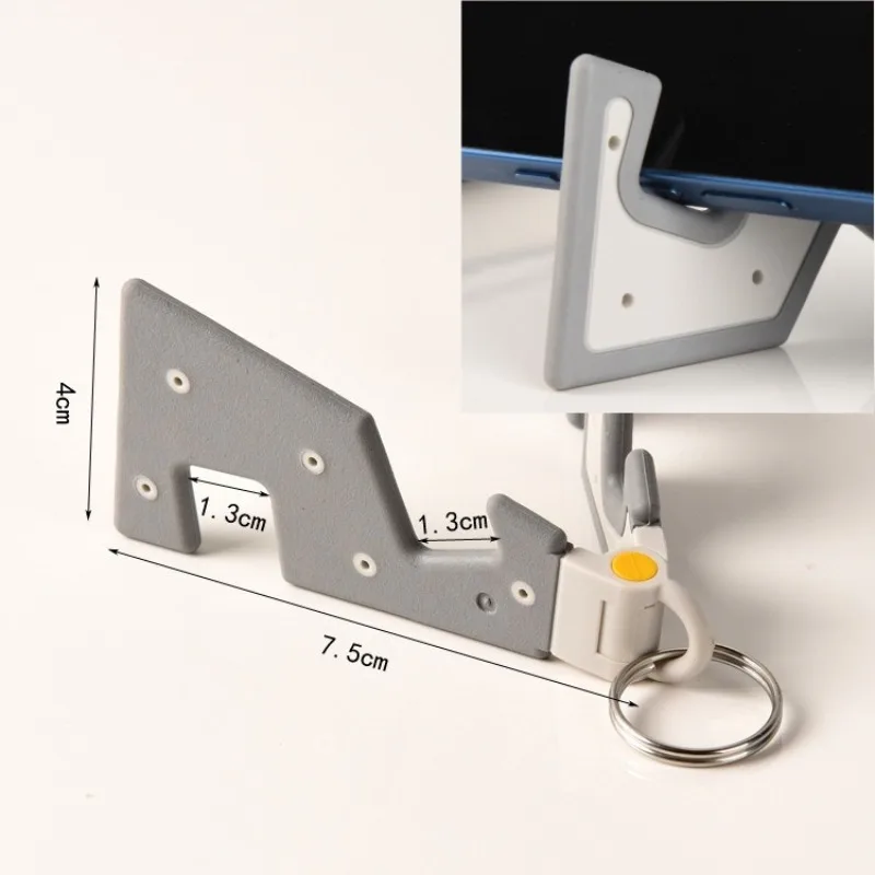1pc Mobile Phone, Tablet, Desktop Stand, Computer Folding, Portable, Mini Multi-functional Waterproof Stand, Key Pendant
1pc Mobile Phone, Tablet, Desktop Stand, Computer Folding, Portable, Mini Multi-functional Waterproof Stand, Key Pendant