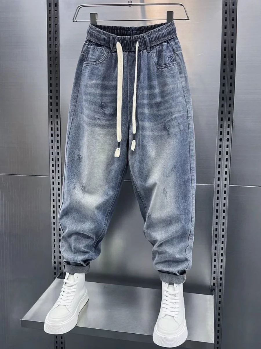 Мужские винтажные джинсы-харлан большого размера, осенне-зимние, повседневные, свободного кроя, с эластичным поясом, высокой талией и шнурком, молодежный тренд
Мужские винтажные джинсы-харлан большого размера, осенне-зимние, повседневные, свободного кроя, с эластичным поясом, высокой талией и шнурком, молодежный тренд