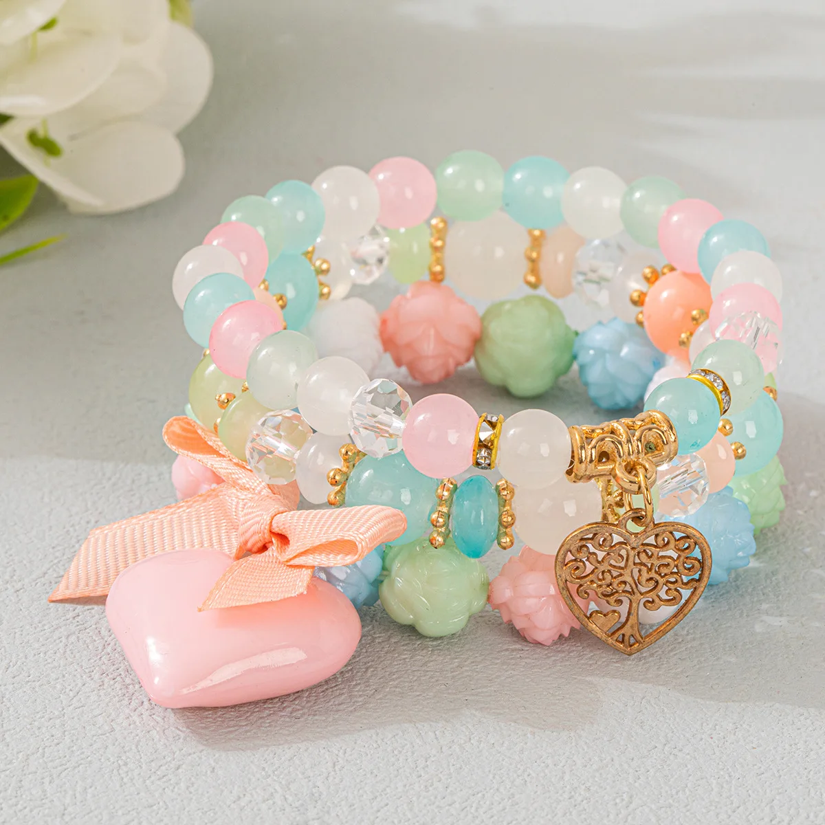 Bohemian hollow love peach heart pendant bracelet, multi-layer beaded bracelet.
Bohemian hollow love peach heart pendant bracelet, multi-layer beaded bracelet.
