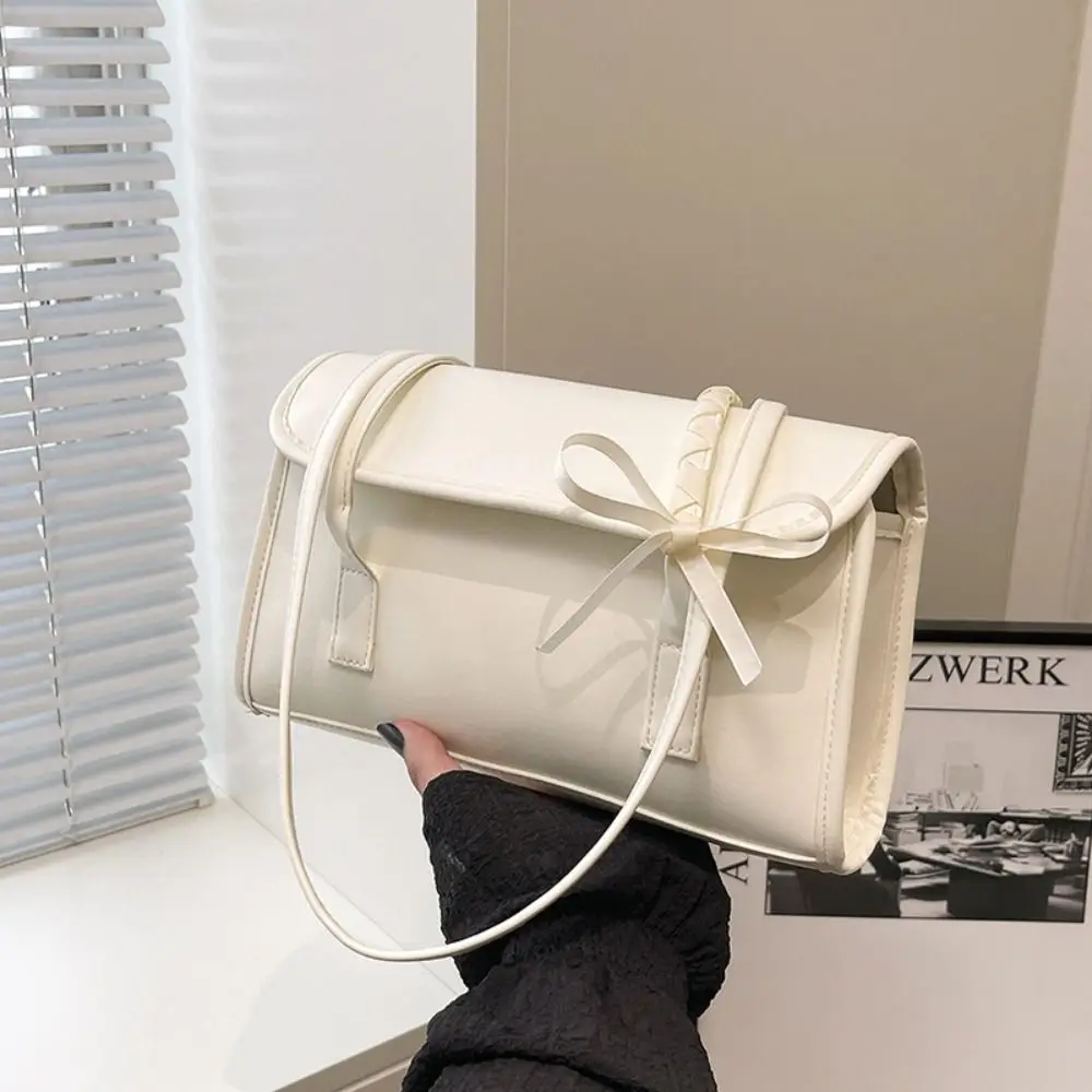Girls Casual Y2K Handbag PU Leather Solid Color Bow Ribbons Large Capacity Portable Underarm Bag
Girls Casual Y2K Handbag PU Leather Solid Color Bow Ribbons Large Capacity Portable Underarm Bag