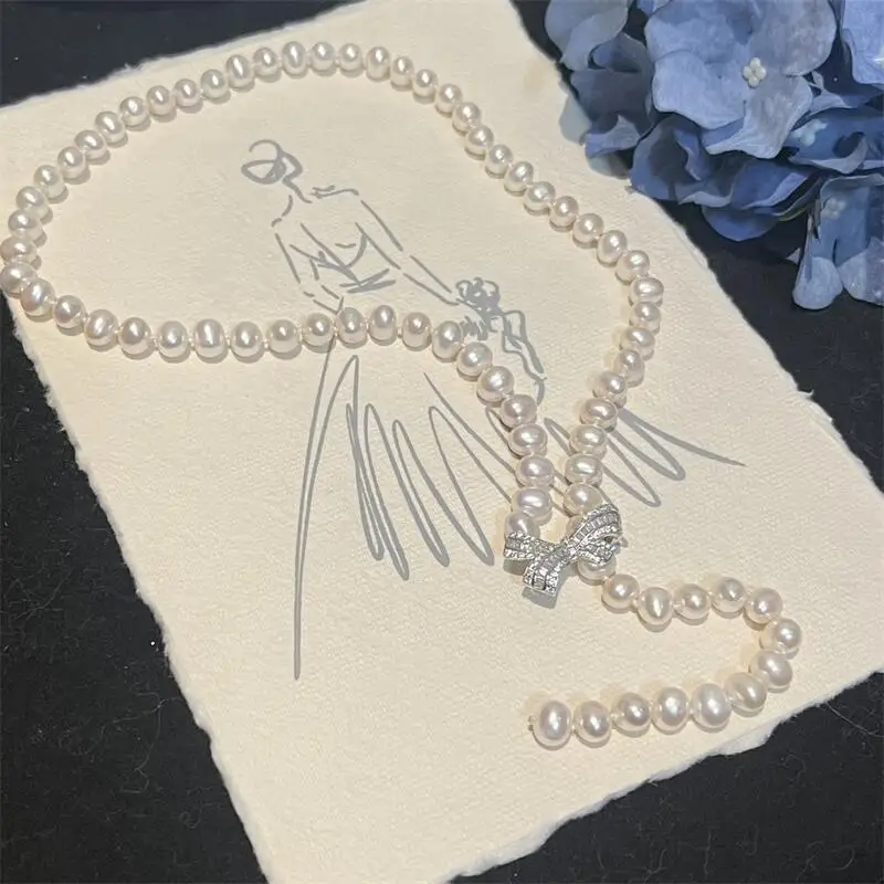 7-8mm Natural Freshwater Pearl Necklace, 58cm Long with S925 Silver Bow Clasp
7-8mm Natural Freshwater Pearl Necklace, 58cm Long with S925 Silver Bow Clasp
