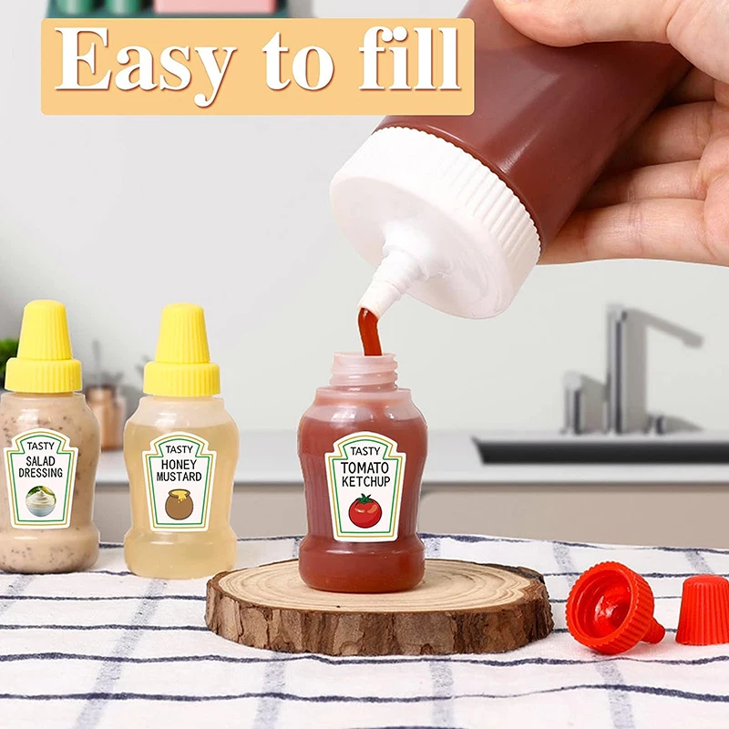 4Pcs Dressing Bottle Mini Tomato Salad Bottle Small Dressing Container Seasoning Storage Bottle Dressing Separately Tank
4Pcs Dressing Bottle Mini Tomato Salad Bottle Small Dressing Container Seasoning Storage Bottle Dressing Separately Tank