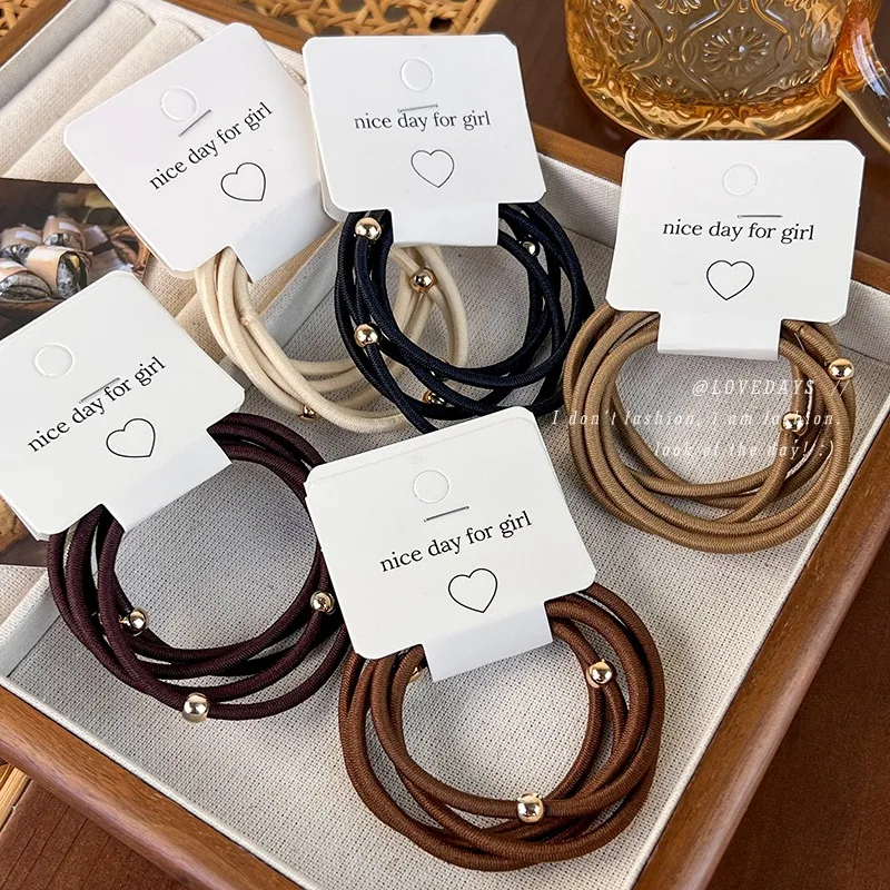 Elastic Hair Tie 5 Pieces Gold Bead Solid Color High Elasticity Stylish Basic Ponytail Holder for Women Durable Comfortable
Elastic Hair Tie 5 Pieces Gold Bead Solid Color High Elasticity Stylish Basic Ponytail Holder for Women Durable Comfortable