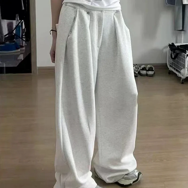 American Autumn and Winter Women's 2024 New Patchwork Button Zipper Pocket Fashion Solid Color Loose and Versatile Casual Pants
American Autumn and Winter Women's 2024 New Patchwork Button Zipper Pocket Fashion Solid Color Loose and Versatile Casual Pants
