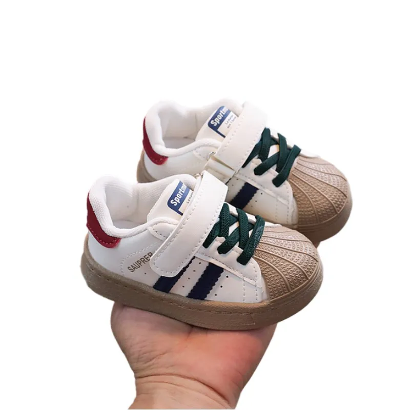 Новая детская спортивная обувь для мальчиков на мягкой подошве, туфли для девочек, противоскользящая модная повседневная обувь, белые туфли 21-30
Новая детская спортивная обувь для мальчиков на мягкой подошве, туфли для девочек, противоскользящая модная повседневная обувь, белые туфли 21-30