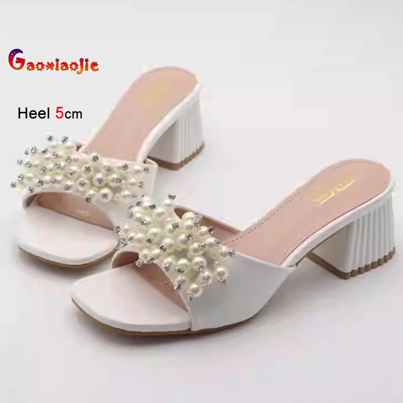 Новинка 2023 года, летняя женская обувь на грубом каблуке, тапочки, модные туфли-лодочки на каблуке с жемчужным украшением, простые повседневные туфли-лодочки на открытом воздухе
Новинка 2023 года, летняя женская обувь на грубом каблуке, тапочки, модные туфли-лодочки на каблуке с жемчужным украшением, простые повседневные туфли-лодочки на открытом воздухе