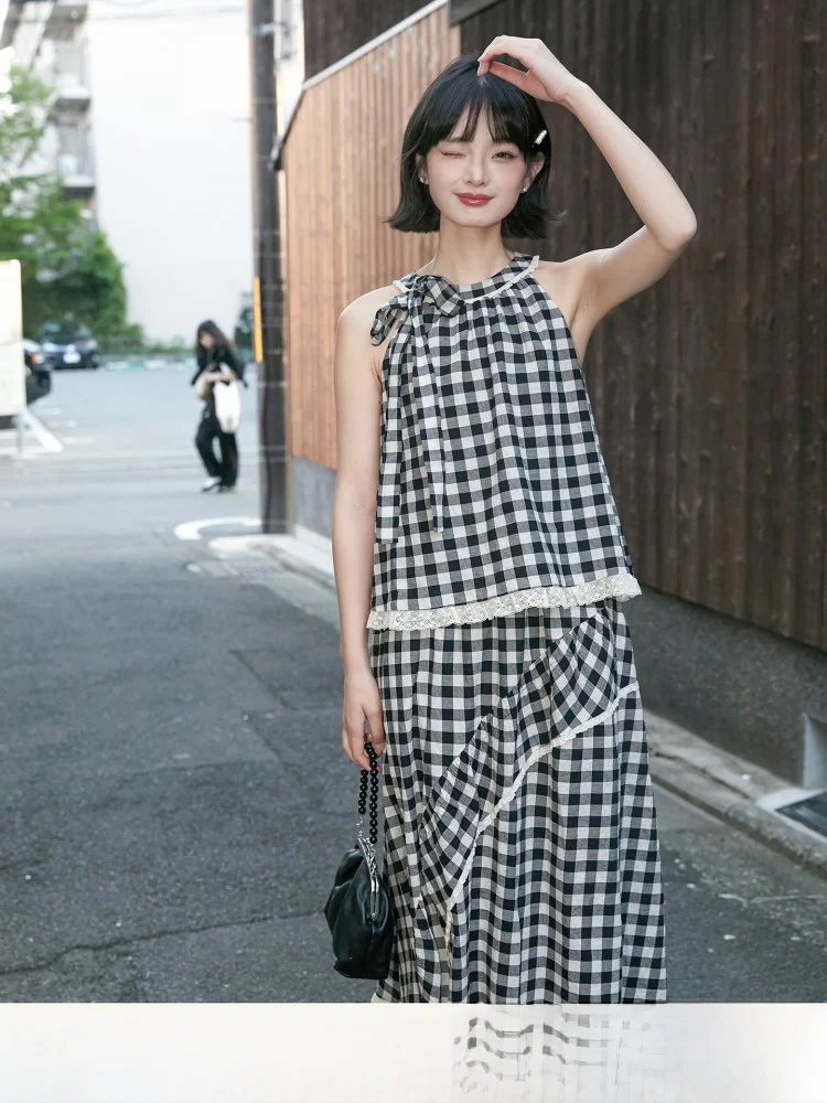 Летний свободный винтажный топ с кружевной отделкой и узлом, женский, черно-белый, оригинальный дизайн, без рукавов, с завязками на шее.
Летний свободный винтажный топ с кружевной отделкой и узлом, женский, черно-белый, оригинальный дизайн, без рукавов, с завязками на шее.