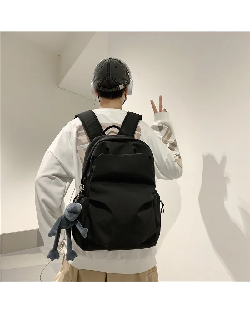Black Minimalist Casual Backpack with Plush Charm Lightweight Water Resistant Fabric Suitable for Daily School Work and Casual
Black Minimalist Casual Backpack with Plush Charm Lightweight Water Resistant Fabric Suitable for Daily School Work and Casual