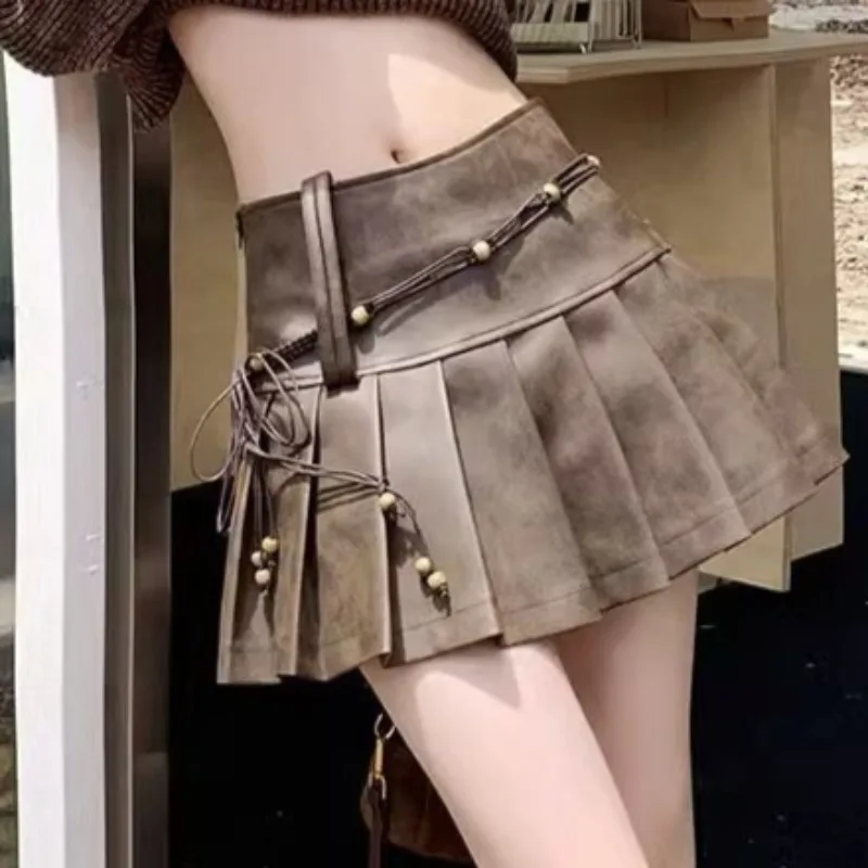 Retro Brown Dopamine Spice Girl Skirts 2025 Autumn Korean All-match Maillard Y2k Slim Waist High Waist PU Pleated A-line Skirt
Retro Brown Dopamine Spice Girl Skirts 2025 Autumn Korean All-match Maillard Y2k Slim Waist High Waist PU Pleated A-line Skirt