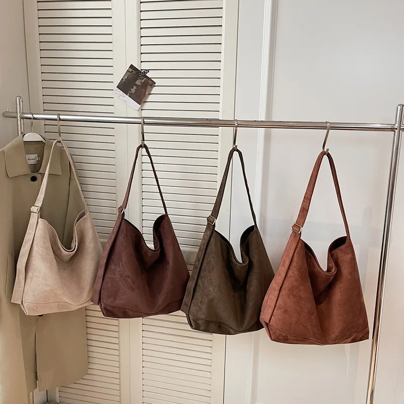 Autumn and winter high-end vintage suede brown tote bag for women2026New versatile large-capacity crossbody bag
Autumn and winter high-end vintage suede brown tote bag for women2026New versatile large-capacity crossbody bag