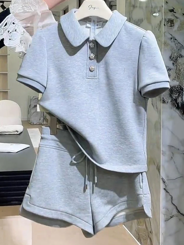Women's summer new gray lapel collar short sleeved top casual wide leg shorts versatile commute simple two-piece set
Women's summer new gray lapel collar short sleeved top casual wide leg shorts versatile commute simple two-piece set
