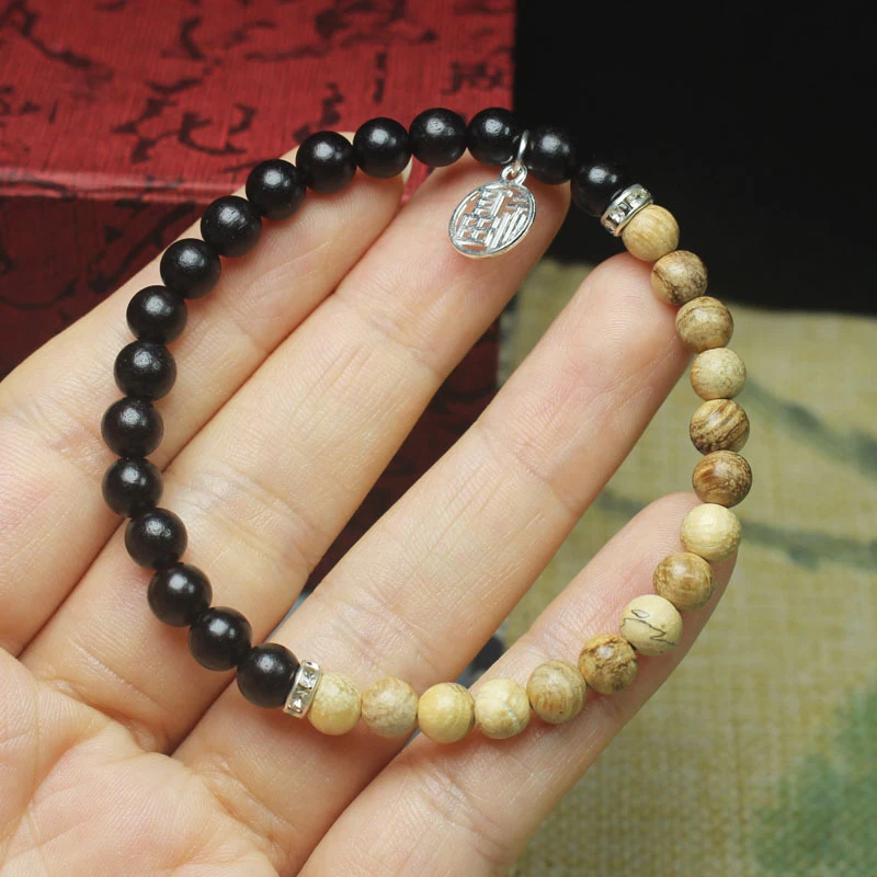 Ebony agarwood 6mm dual-tone bracelet for men and women, personalized ethnic style Buddhist prayer beads
Ebony agarwood 6mm dual-tone bracelet for men and women, personalized ethnic style Buddhist prayer beads