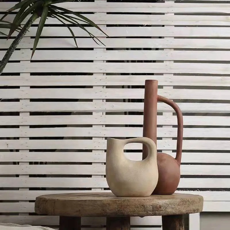 Wabi Sand wind ceramic vase ornament Nordic retro art flower ware model room living room flower arrangement soft desktop jewelry
Wabi Sand wind ceramic vase ornament Nordic retro art flower ware model room living room flower arrangement soft desktop jewelry