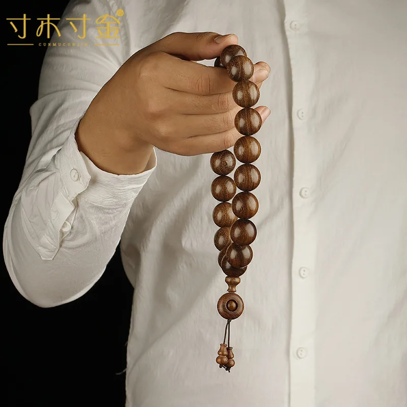 2.0cm Ebony Golden Sandalwood Prayer Beads Bracelet 19 Beads Wood Pendant for Men Gifts
2.0cm Ebony Golden Sandalwood Prayer Beads Bracelet 19 Beads Wood Pendant for Men Gifts