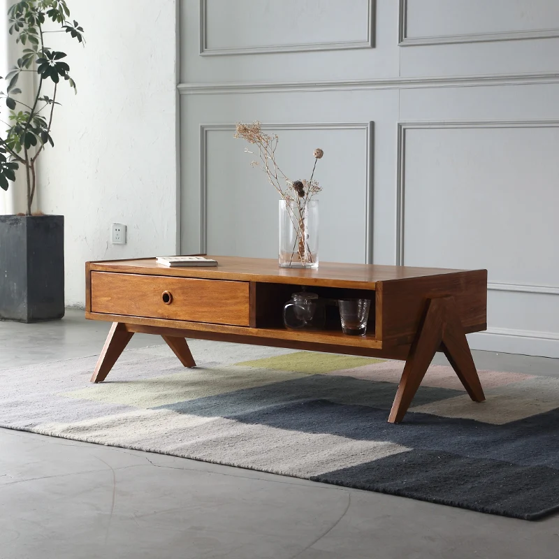 Huangyang solid wood coffee table retro designer living room small apartment Nordic medieval furniture
Huangyang solid wood coffee table retro designer living room small apartment Nordic medieval furniture