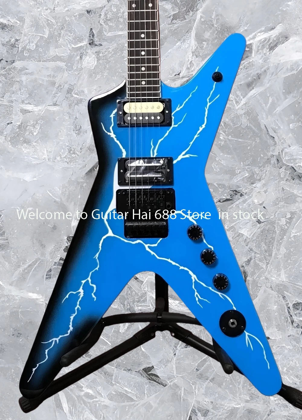Chinese electric guitar Dimebag Dean ML comes from Hell and features a blue lighting body with a bridge #5462899
Chinese electric guitar Dimebag Dean ML comes from Hell and features a blue lighting body with a bridge #5462899