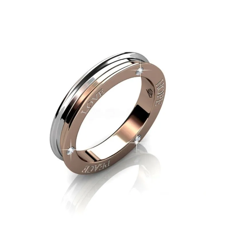 Daisini Bi Color Band Ювелирное кольцо для пары из нержавеющей стали с позолотой 18 карат, украшенное премиальными кристаллами Swarovski
Daisini Bi Color Band Ювелирное кольцо для пары из нержавеющей стали с позолотой 18 карат, украшенное премиальными кристаллами Swarovski