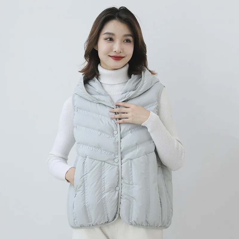 2023 Autumn Winter Women Hooded Waistcoat Ultra Light White Duck Down Vest Coat Lady Warm Oversize Parkas Sleeveless Short Tank
2023 Autumn Winter Women Hooded Waistcoat Ultra Light White Duck Down Vest Coat Lady Warm Oversize Parkas Sleeveless Short Tank