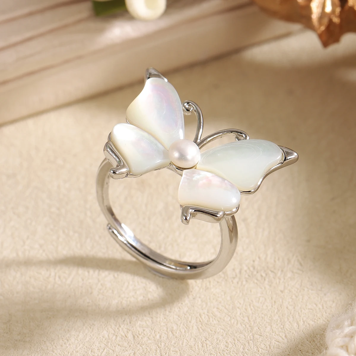 Elegant Mother-of-Pearl Butterfly Ring with Pearl Accent - Silver Plated Statement Ring for Women, Hypoallergenic & Waterproof
Elegant Mother-of-Pearl Butterfly Ring with Pearl Accent - Silver Plated Statement Ring for Women, Hypoallergenic & Waterproof