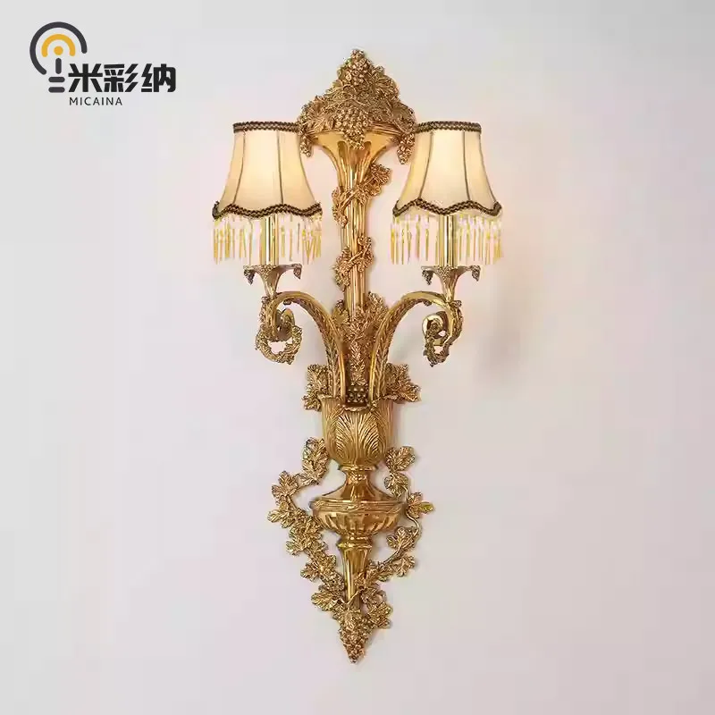 Baroque copper villa living room background wall large wall lamp French luxury hotel lobby club project double head lamp
Baroque copper villa living room background wall large wall lamp French luxury hotel lobby club project double head lamp