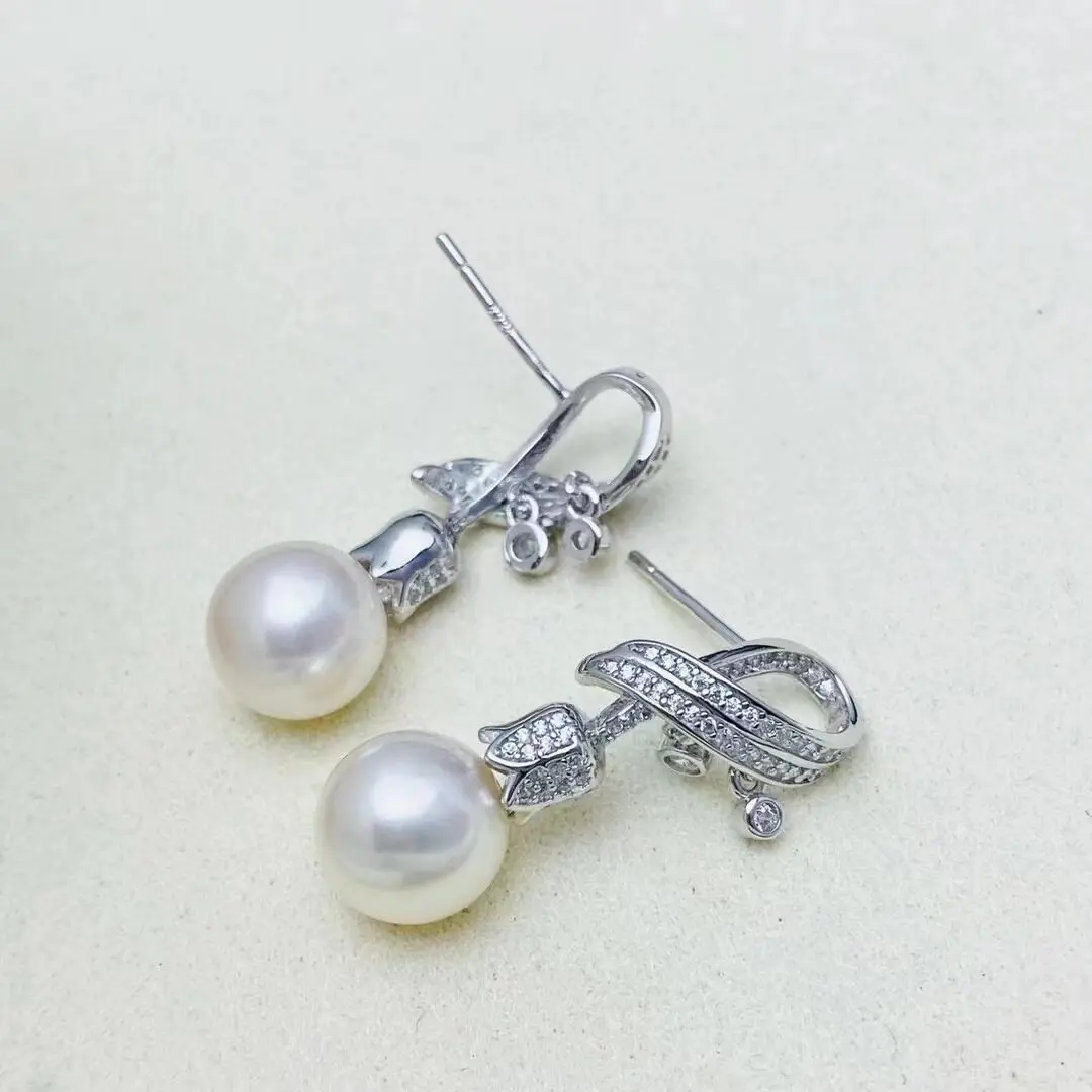 Fashionable new earrings AAAA9-10mm natural round pearl earrings 925s
Fashionable new earrings AAAA9-10mm natural round pearl earrings 925s