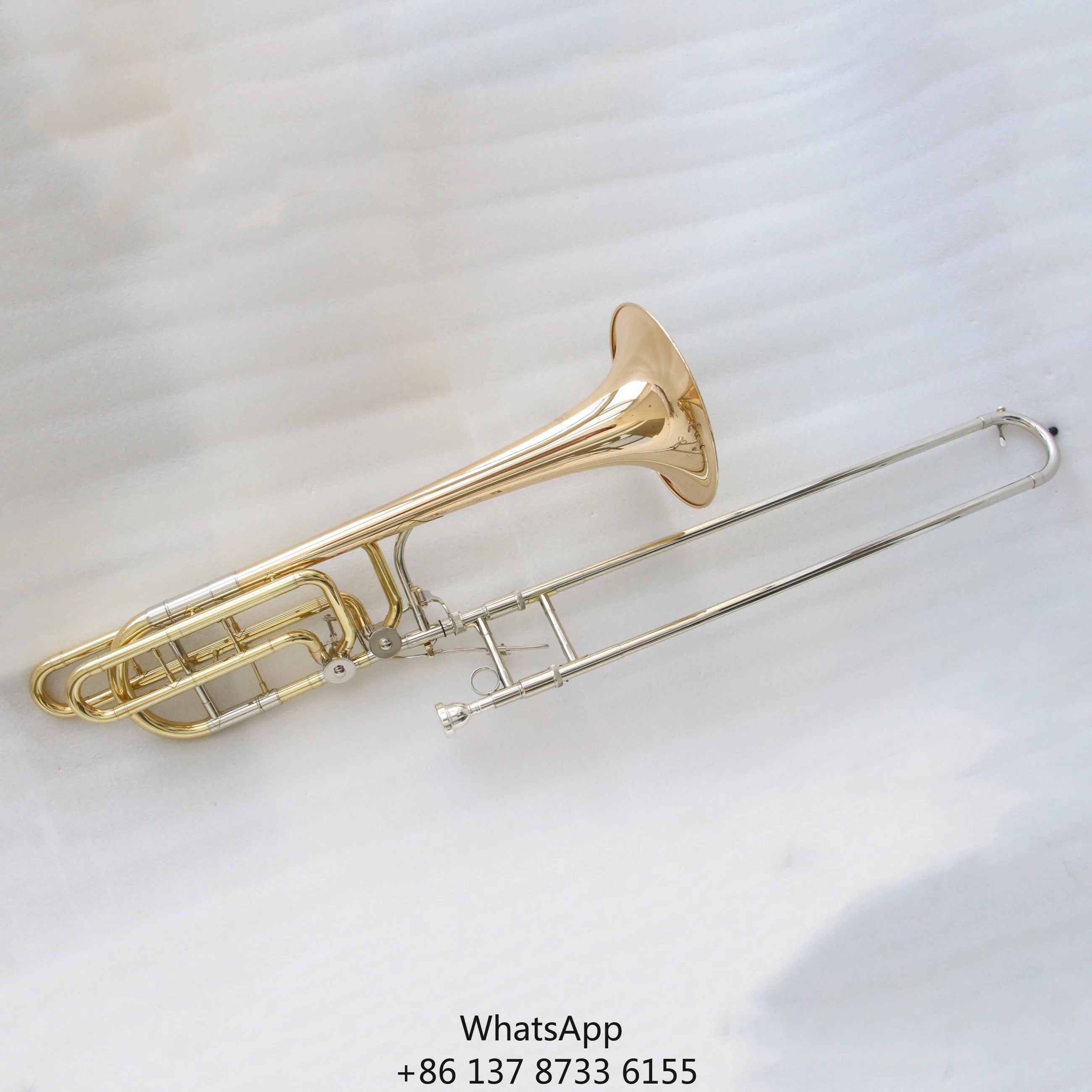 Focustyle FTB-700G Clear Lacquered Yellow Brass Bass Trombone 14.20mm Bore 241mm Bell Made China Bb/F/Gb/D Good Price High
Focustyle FTB-700G Clear Lacquered Yellow Brass Bass Trombone 14.20mm Bore 241mm Bell Made China Bb/F/Gb/D Good Price High