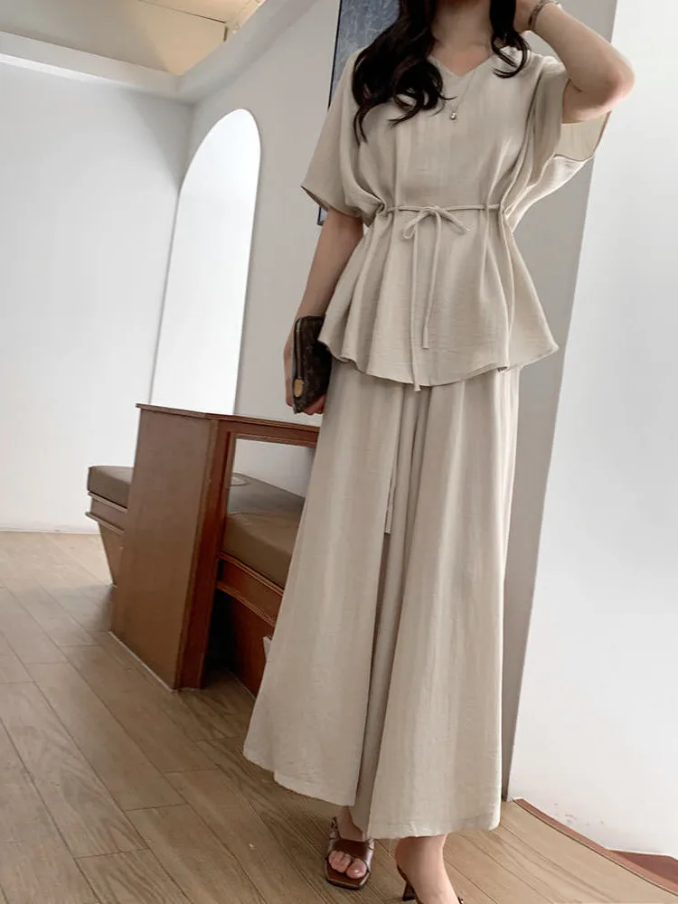 Korean Sle Women's Summer Outfit V-ne Loose Dstring Waist Top plus Elastic Wide Leg Pants Two-piece Set Faionable Ca...
Korean Sle Women's Summer Outfit V-ne Loose Dstring Waist Top plus Elastic Wide Leg Pants Two-piece Set Faionable Ca...
