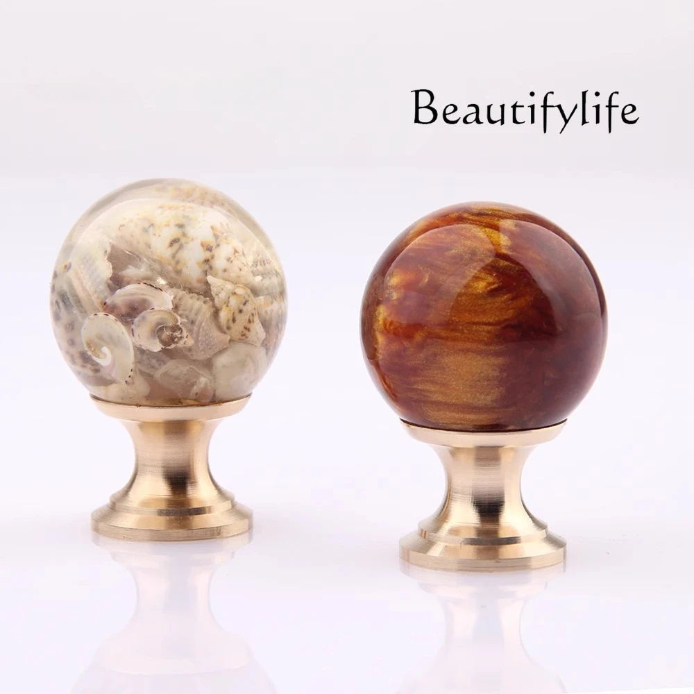 Upgraded light luxury creative amber shell copper small handle, drawer, cabinet door small handle, resin single hole handle
Upgraded light luxury creative amber shell copper small handle, drawer, cabinet door small handle, resin single hole handle