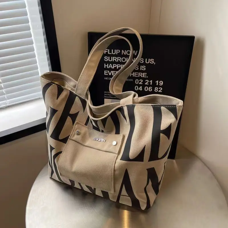 New Large capacity Single Shoulder Canvas Bag Stylish Letter Style Student Install books Handbag for Class, Fashion Shopping Bag
New Large capacity Single Shoulder Canvas Bag Stylish Letter Style Student Install books Handbag for Class, Fashion Shopping Bag