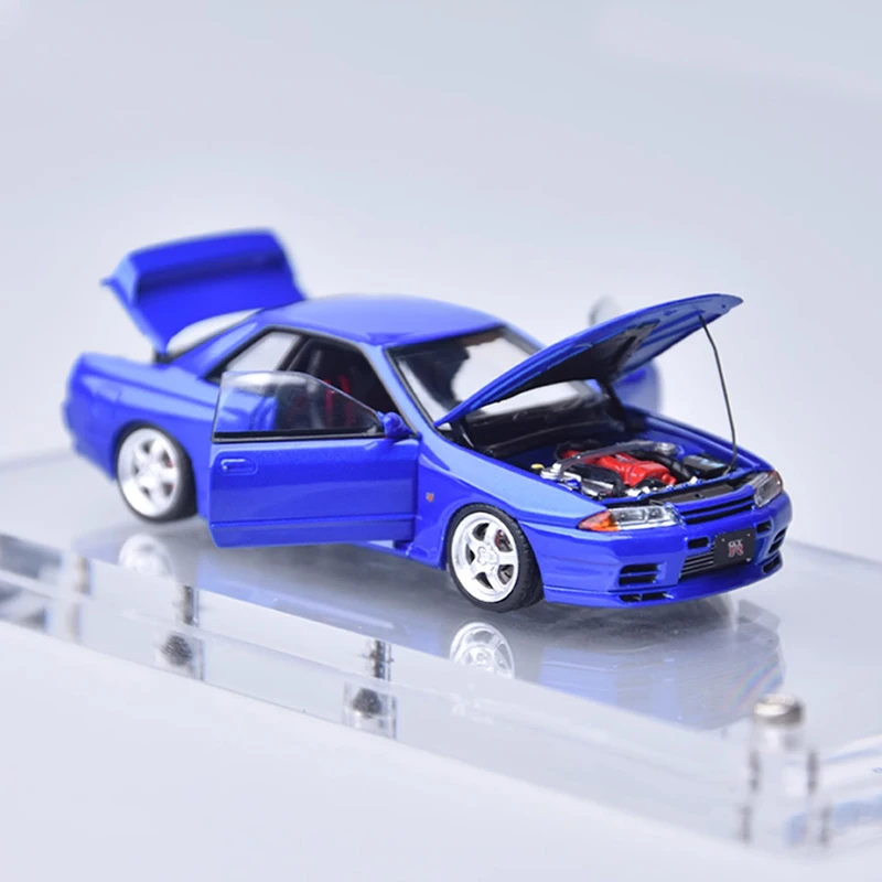 Литая под давлением оригинальная модель из сплава GT-R R32, масштаб 1:64, имитация классического украшения, хобби, сувениры, коллекция подарков, статический дисплей
Литая под давлением оригинальная модель из сплава GT-R R32, масштаб 1:64, имитация классического украшения, хобби, сувениры, коллекция подарков, статический дисплей