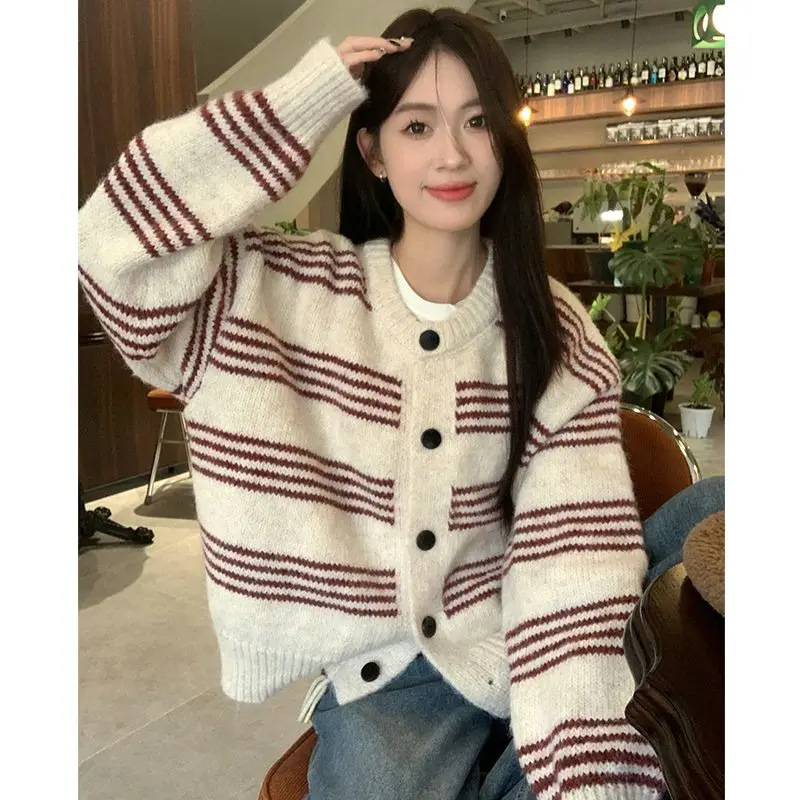 Autumn and winter Korean style loose striped single-breasted lazy style versatile thick warm knitted sweater jacket fashion tops
Autumn and winter Korean style loose striped single-breasted lazy style versatile thick warm knitted sweater jacket fashion tops