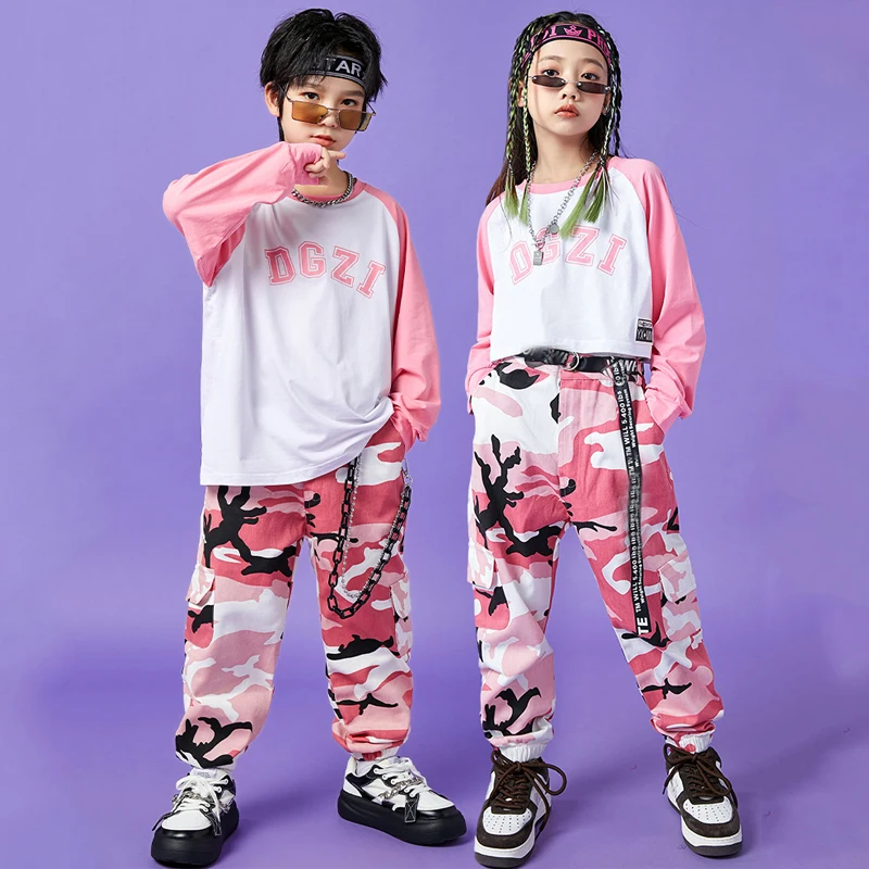 Детская сценическая одежда в стиле K-POP, одежда в стиле хип-хоп для мальчиков и девочек, костюмы джаза, розовая футболка, камуфляжные брюки, одежда для уличного танца SL7667
Детская сценическая одежда в стиле K-POP, одежда в стиле хип-хоп для мальчиков и девочек, костюмы джаза, розовая футболка, камуфляжные брюки, одежда для уличного танца SL7667