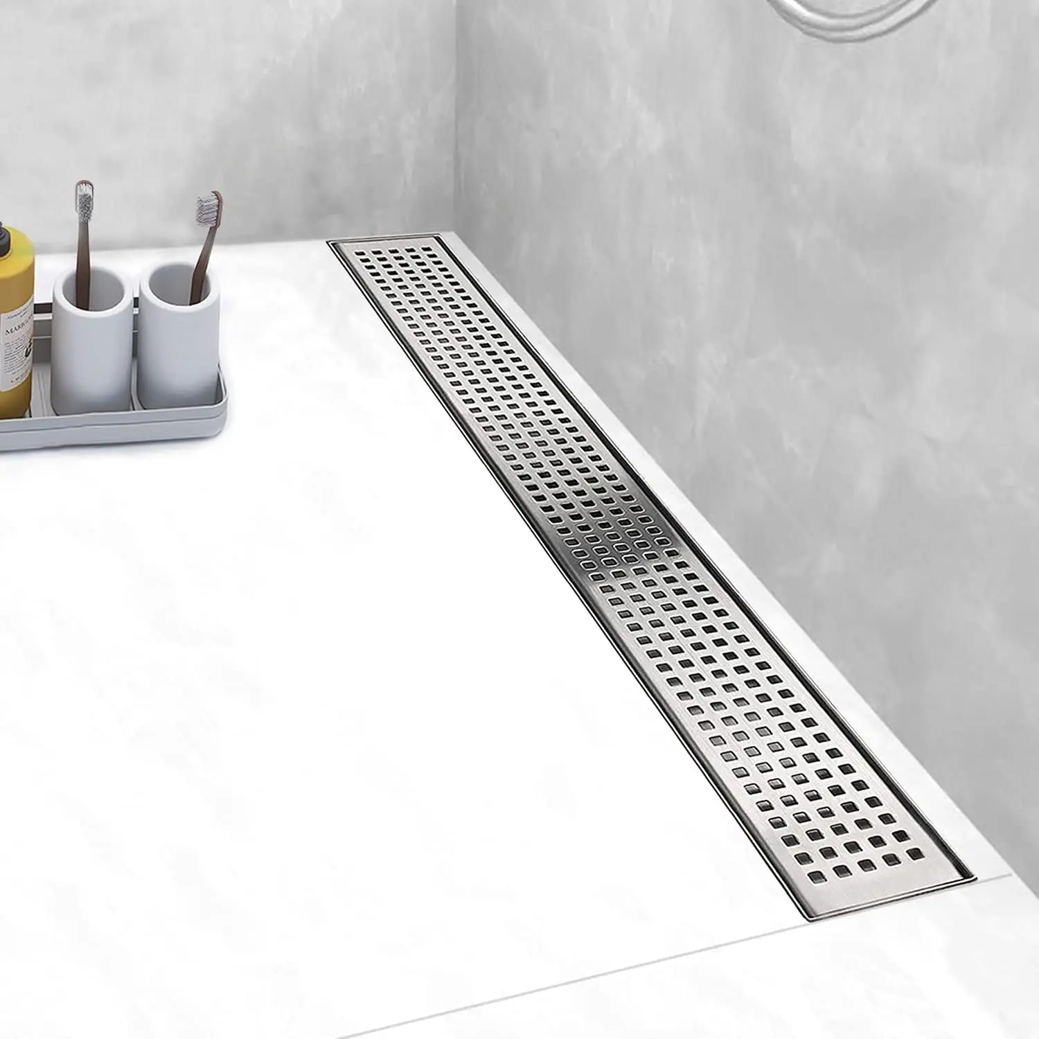24 Inch Stainless Steel Linear Shower Drain with Removable Grate, Hair Catcher and Leveling Feet
24 Inch Stainless Steel Linear Shower Drain with Removable Grate, Hair Catcher and Leveling Feet