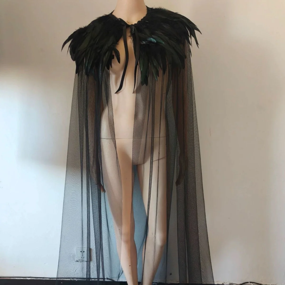 Feather Cape Party Cloak
Feather Cape Party Cloak